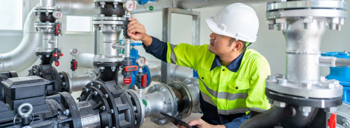 Correcting Pump Shaft Misalignment - Pumpworks showing worker testing pump